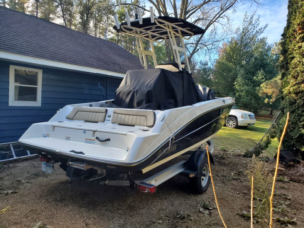 Runabout With Radar Bridge Shrink-Wrap for Winter Storage at Client Location.